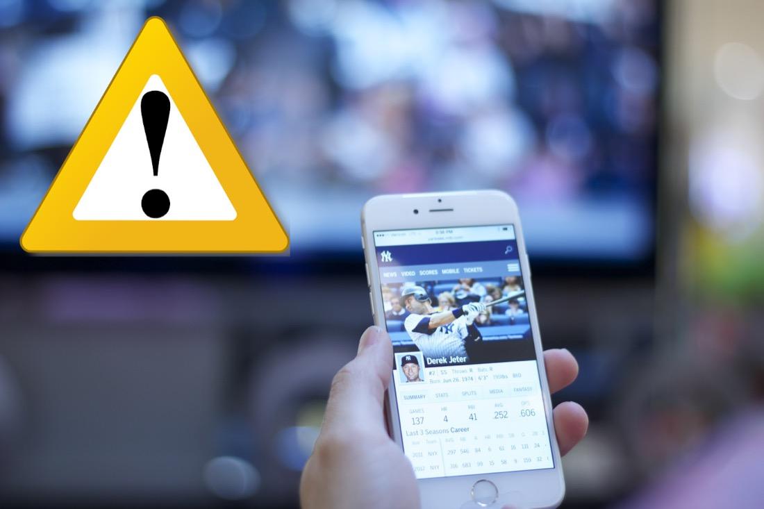 mobile phone with warning sign