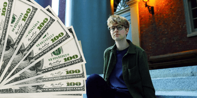 Dollarsedlar och unga miljardären Arvid Lunnemark, medgrundare av Anysphere.