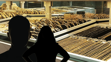 Två mörka siluetter framför smycken av guld.